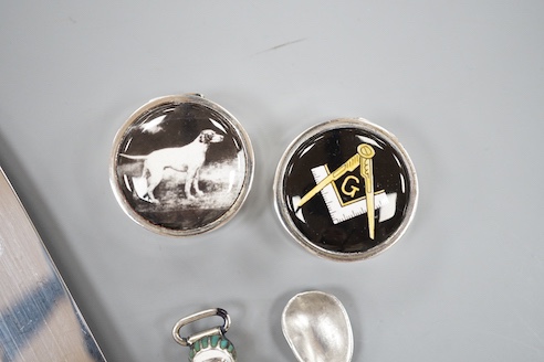 A cased set of six silver teaspoons, a silver bread knife, two 925 pill boxes, an 800 and enamel 'Tutankhamun' pencil case and a silver condiment spoon.